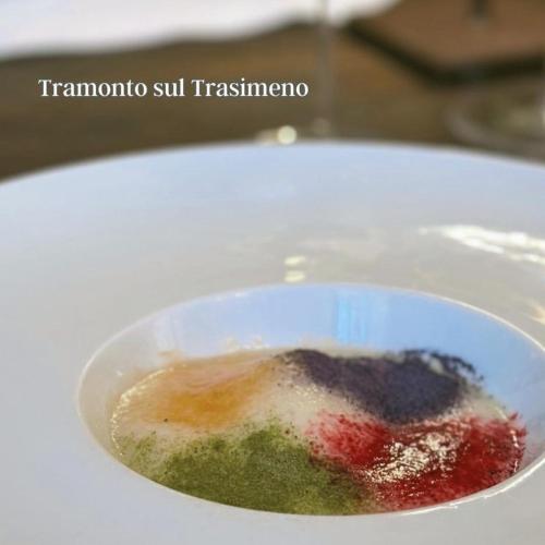 a bowl of food with a strawberry in it at La Locanda Del Capitano in Montone