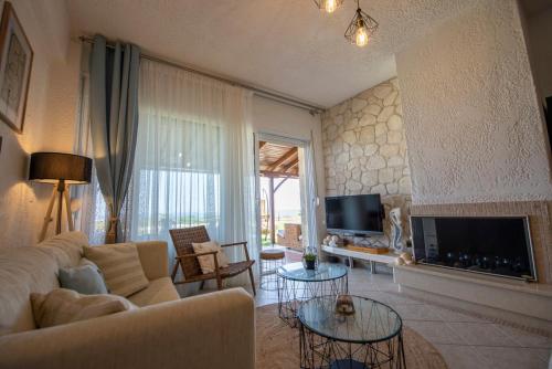 Μια τηλεόραση ή/και κέντρο ψυχαγωγίας στο Thea Holiday Home