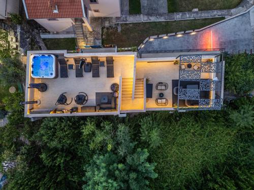 an overhead view of a house with a roof at Marea DeLuxe Apartments in Kotor