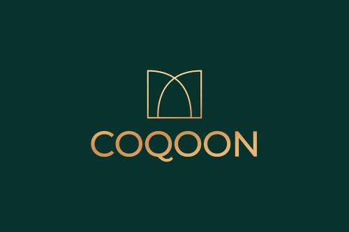 a logo for a bookstore with a book at Charlotte House Residence by COQOON in Manchester