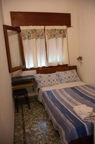 Postel nebo postele na pokoji v ubytování Hosteria Sans Souci