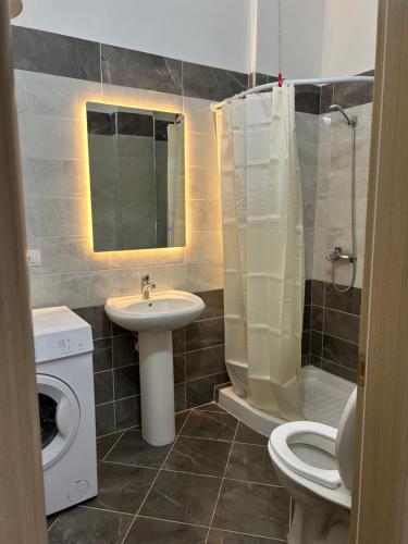 Ett badrum på Apartament's Dejvi