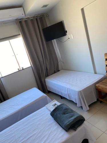 Katil atau katil-katil dalam bilik di Ribeiro Suit's Hotel