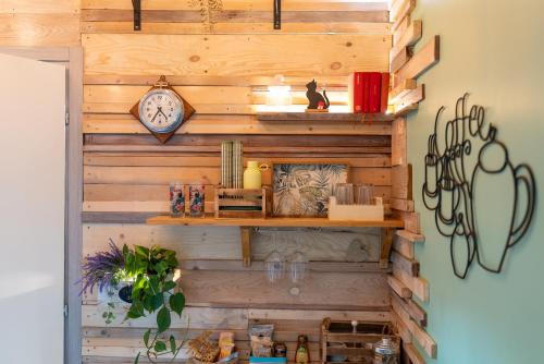 a wooden wall with a clock on it at BBSUITE21 Maranello in Maranello