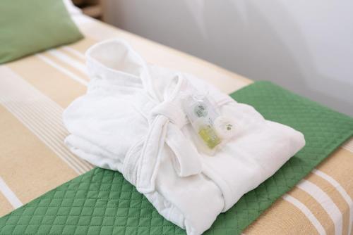 a pile of white towels sitting on a table at BBSUITE21 Maranello in Maranello