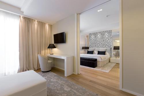 Ένα ή περισσότερα κρεβάτια σε δωμάτιο στο Hotel Lungomare