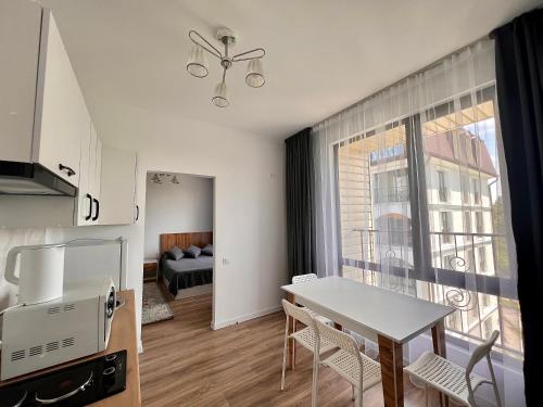 Dapur atau dapur kecil di Квартира в Радуга Плюс