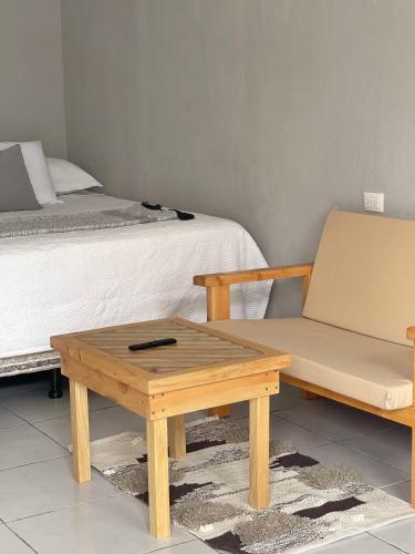 Postel nebo postele na pokoji v ubytování Habitacion privada Lamat I