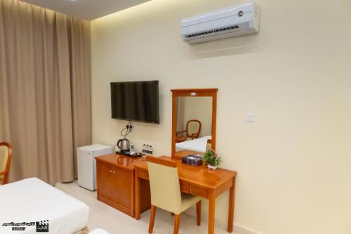 TV a/nebo společenská místnost v ubytování Al Jabal Hotel