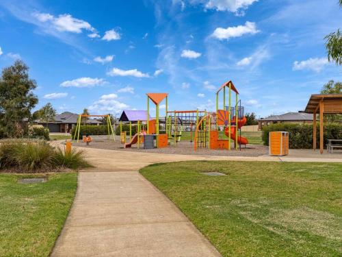 a park with a playground with at Popular Villa Shepparton in Shepparton
