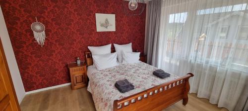 Postel nebo postele na pokoji v ubytování Orchidee Altenau