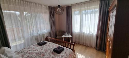 Postel nebo postele na pokoji v ubytování Orchidee Altenau