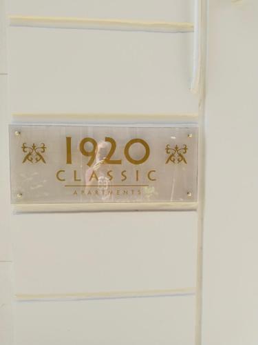 a sign for a chinese restaurant on a shelf at 1920 Classic in Kalamata