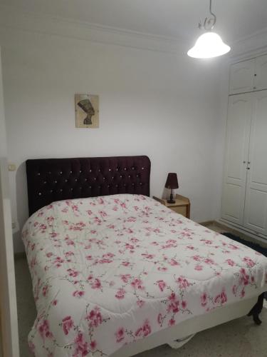 Postel nebo postele na pokoji v ubytování Appartement meublé