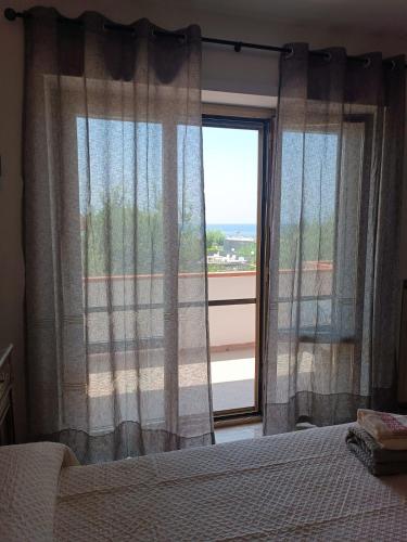Postel nebo postele na pokoji v ubytování Profumo di Mare