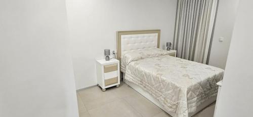 En eller flere senge i et værelse på Santa Pola Hills