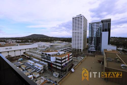 an aerial view of a city with tall buildings at 2bd 2bth - Chic Apt in Woden CBD in Phillip
