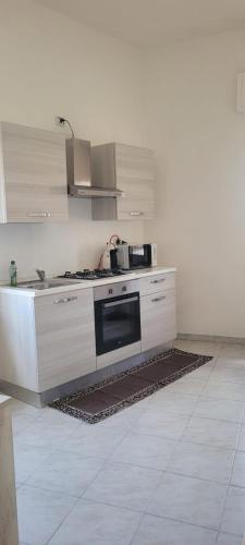 Η κουζίνα ή μικρή κουζίνα στο La Mimosa