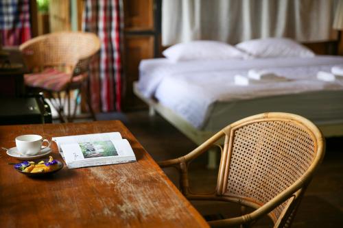 Postel nebo postele na pokoji v ubytování Hang Tueng farm stay Chiang Mai แฮงตึง ฟาร์มสเตย์ เชียงใหม่