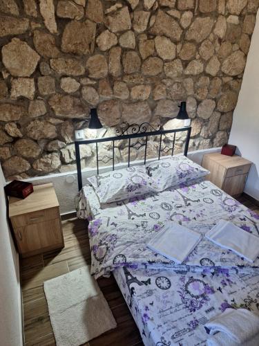 Postel nebo postele na pokoji v ubytování Apartman Krivošije