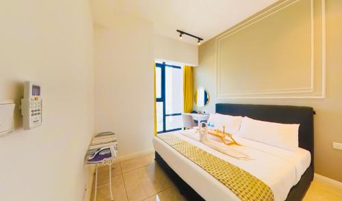 a bedroom with a bed and a mirror and a window at Axon Residence KLCC - KL HOME in Kuala Lumpur