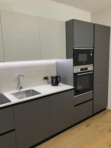 Dapur atau dapur kecil di Suite Santa Maria