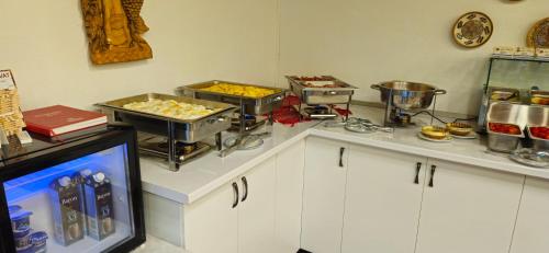 Kuchyň nebo kuchyňský kout v ubytování Ilinca