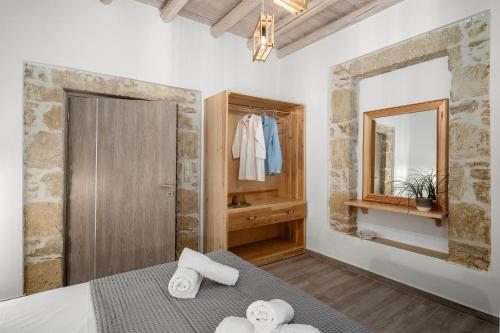 Postel nebo postele na pokoji v ubytování Papadia Luxury Apartments