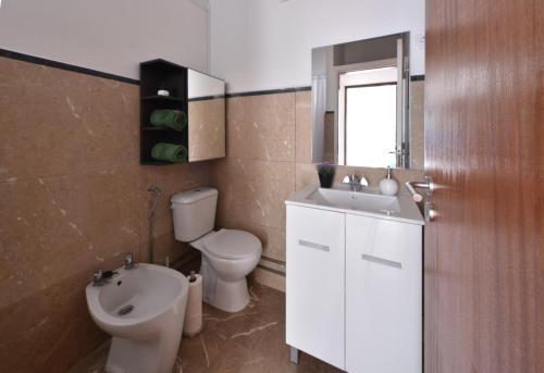 Koupelna v ubytování PinPorto City Center I