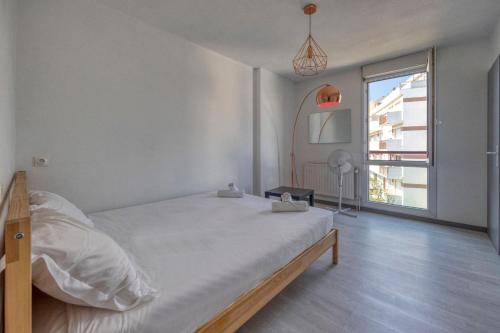 Postel nebo postele na pokoji v ubytování Le Jungle - Rocade - Grand Place