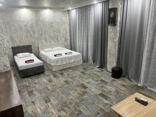Llit o llits en una habitació de LeFlore Hotel