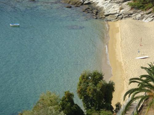 an aerial view of a beach and the ocean at Palio Seaside Escape in Kavala