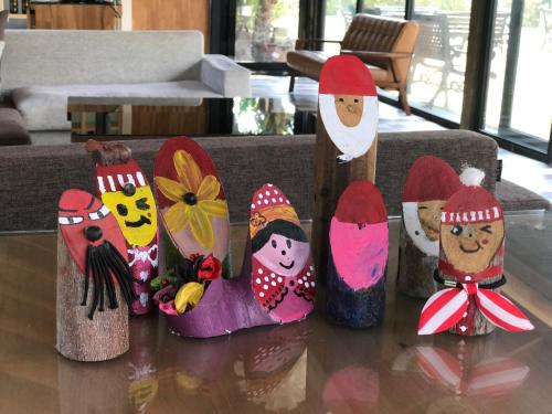 a group of wooden ornaments on a table at My Chateau Resort in Kenting