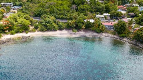 an aerial view of a beach and the ocean at Villa Ti'twoine in Pointe-Noire