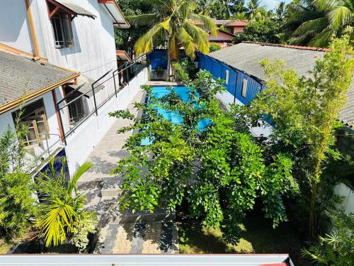 an overhead view of a swimming pool with trees at Hidden Heaven Villa in Beruwala