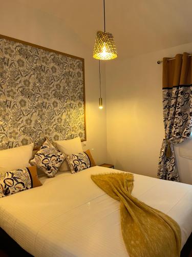 Ένα ή περισσότερα κρεβάτια σε δωμάτιο στο Aquitain Home chambre studio appartement Gare Saint Jean