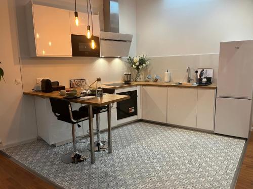 Η κουζίνα ή μικρή κουζίνα στο Aquitain Home chambre studio appartement Gare Saint Jean
