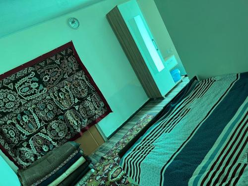 "Bilim" Guest House客房内的一张或多张床位