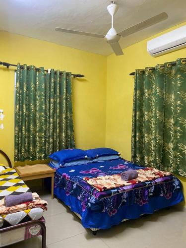 Ένα ή περισσότερα κρεβάτια σε δωμάτιο στο Homestay Zalida C Musleem