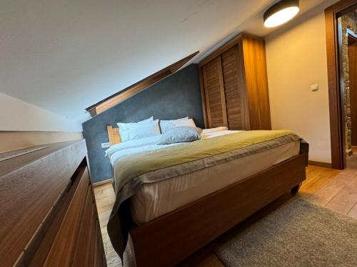 Postel nebo postele na pokoji v ubytování Apartman B610 Hotel Vucko Jahorina