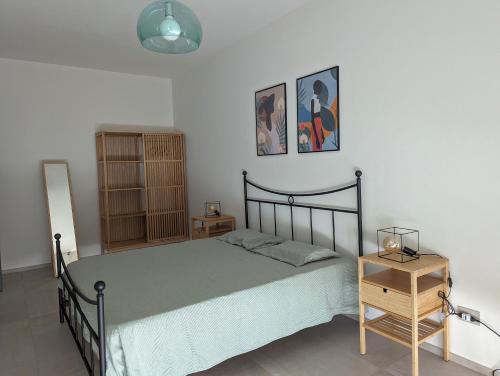 Postel nebo postele na pokoji v ubytování Casa Fontanarosa