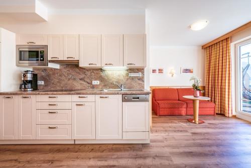 Kuchyň nebo kuchyňský kout v ubytování Apparthotel Sonnenhof