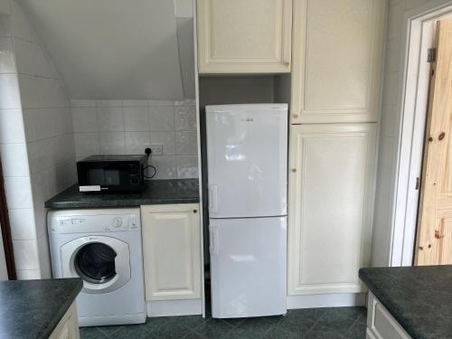 Η κουζίνα ή μικρή κουζίνα στο 3-Bed House - Sleeps 5 with free on street parking