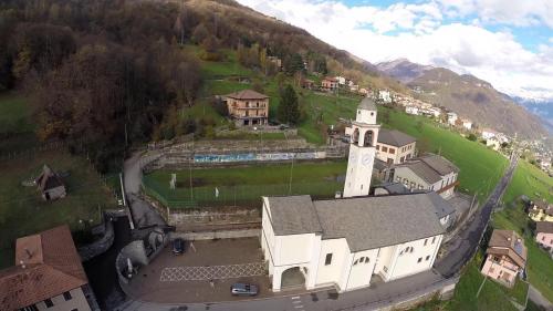 an aerial view of a building with a clock tower at Casa Maya in Stazzona