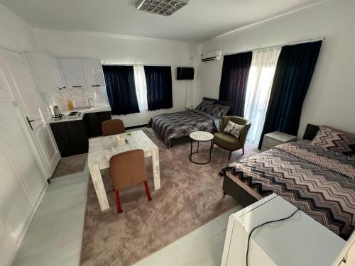 Ένα ή περισσότερα κρεβάτια σε δωμάτιο στο Green island