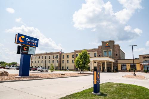 a building with a sign for a union suites at Comfort Suites University Brookings in Brookings