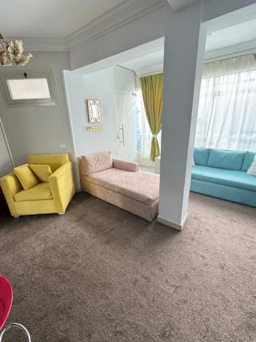 a living room with a couch and a chair at Casa Lydia in Naama Bay in Sharm El Sheikh