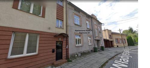 a building on the side of a street at Apartament Zacisze 5 in Przemyśl
