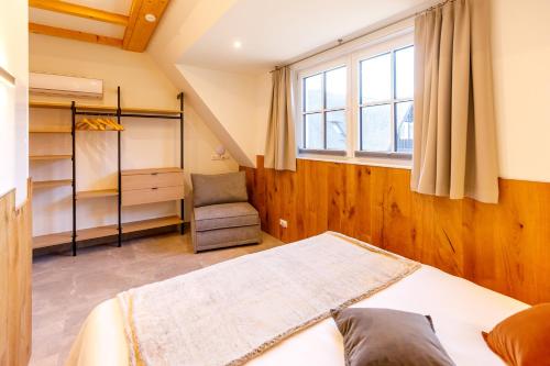 Ένα ή περισσότερα κρεβάτια σε δωμάτιο στο Spreewald Chalet Wohnung Spreeblick