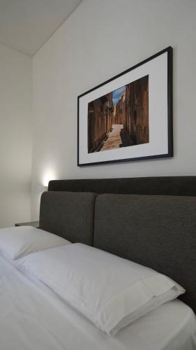Postel nebo postele na pokoji v ubytování Vento e salsedine